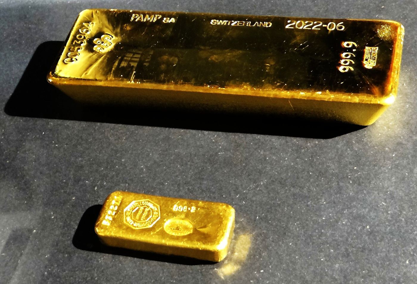 Stacks of gold bars in a vault